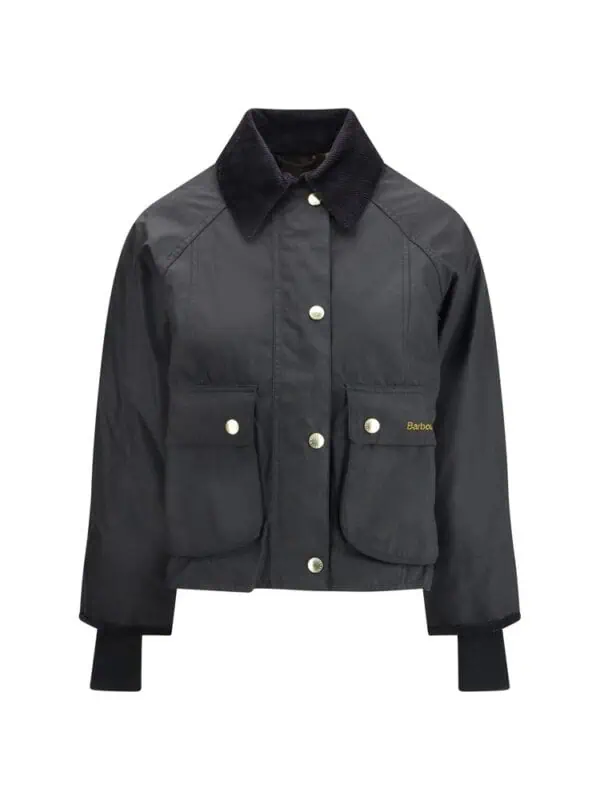 Black Barbour utility jacket with large front pockets and a corduroy collar, perfect for stylish outerwear.