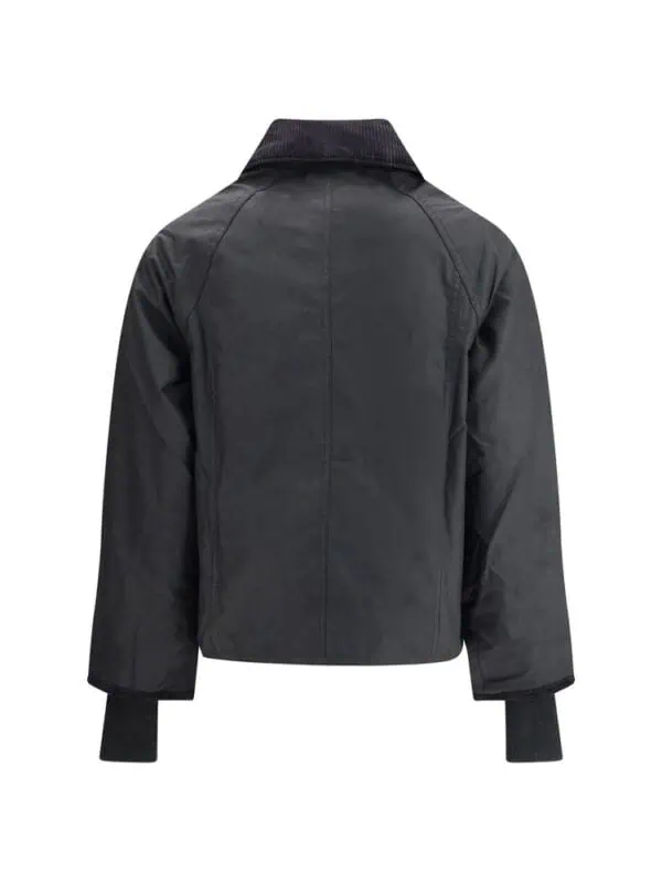 Black bomber jacket with quilted lining and ribbed cuffs for a stylish and comfortable look. Perfect for casual wear or layering in cooler weather. Made from durable materials for long-lasting use.