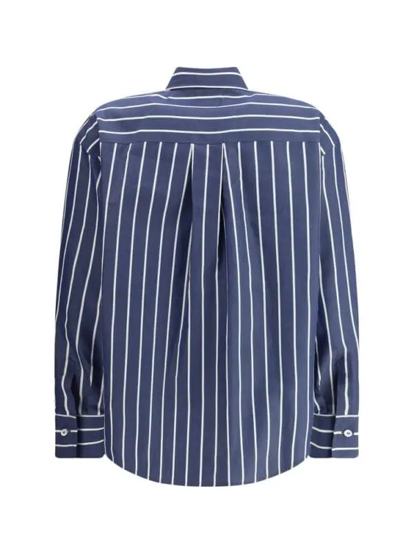 Striped navy blue and white men's dress shirt with classic collar and button cuffs, stylish and elegant for formal or business occasions.