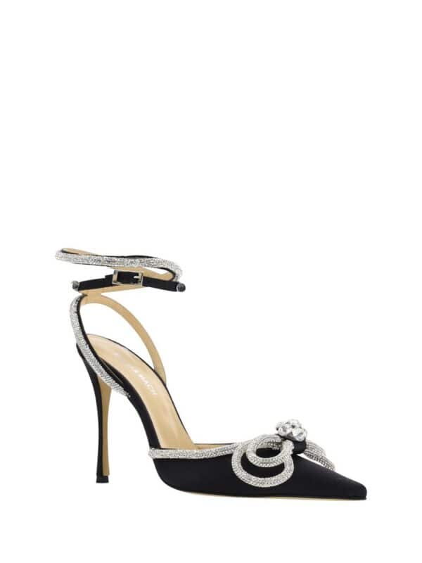 Elegant black high heel shoe with crystal embellishments, pointed toe, and ankle strap featuring a decorative bow detail. Perfect for formal and upscale events.