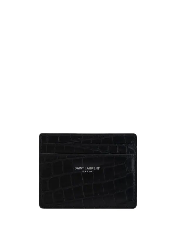 Black Saint Laurent Paris crocodile-embossed leather cardholder with silver logo detail.
