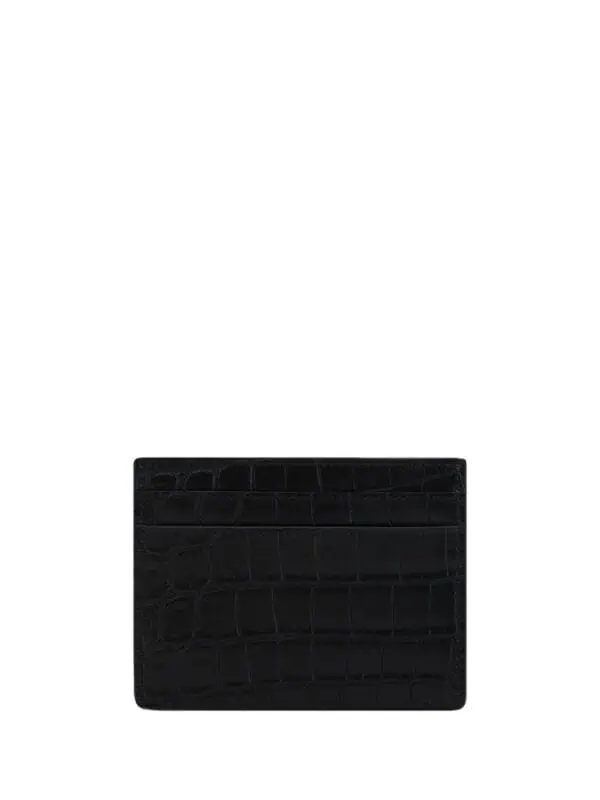 Black crocodile-embossed leather card holder, luxury slim wallet for men and women, minimalist designer money clip accessory.