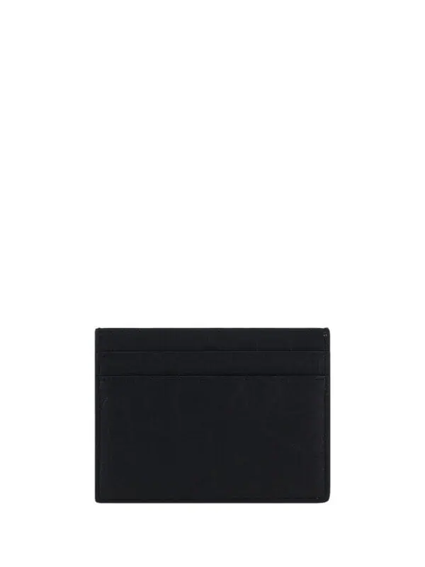Slim black leather card holder with multiple card slots for everyday organization. Perfect for stylish, minimalist men and women.