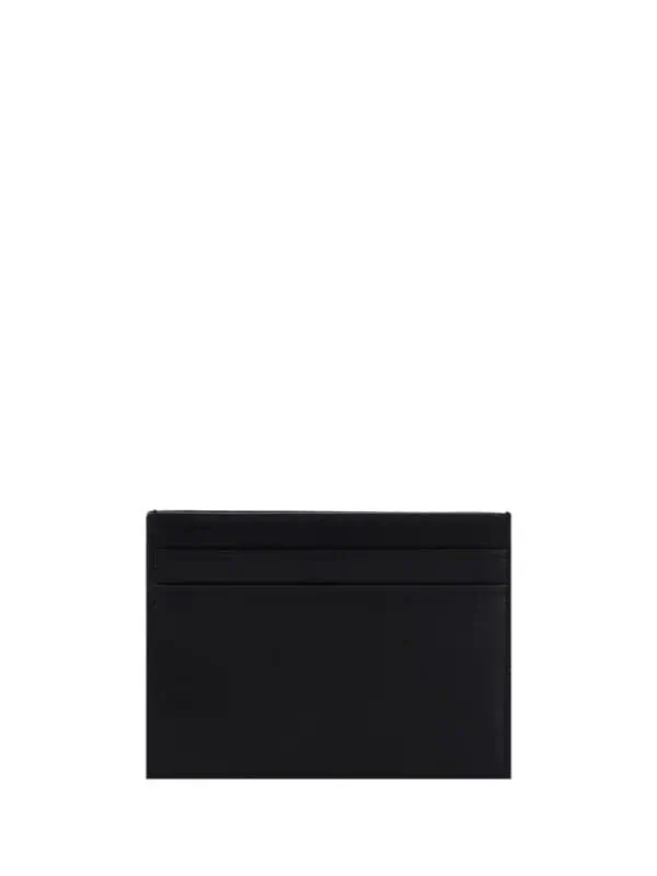 Black minimalist cardholder made of premium leather for men and women, featuring multiple card slots for sleek organization.