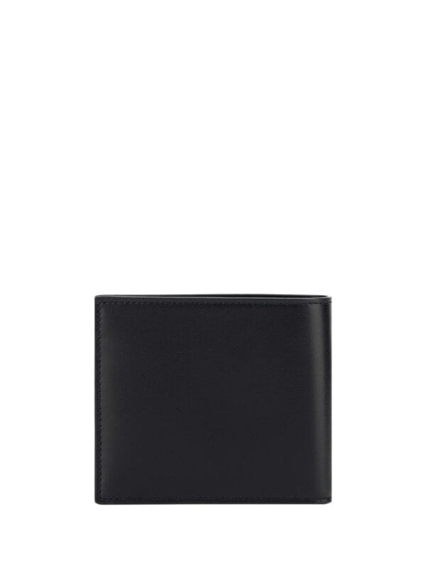 Black leather men's wallet for luxury fashion and everyday use. Slim, stylish, and high-quality design perfect for sophisticated accessories. Durable with secure cash and card slots.
