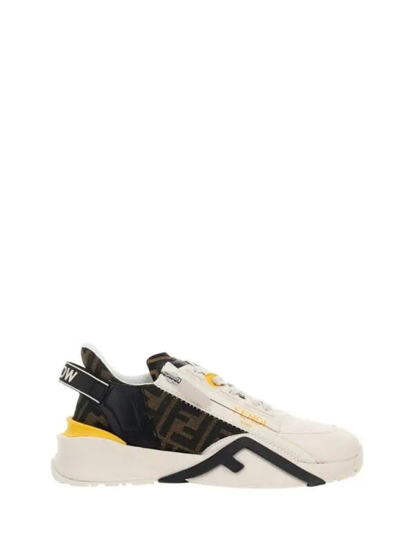 Fendi sneaker with luxury designer details, black and white colorway with logo accents and modern sole design. Perfect for high-end fashion and streetwear style.