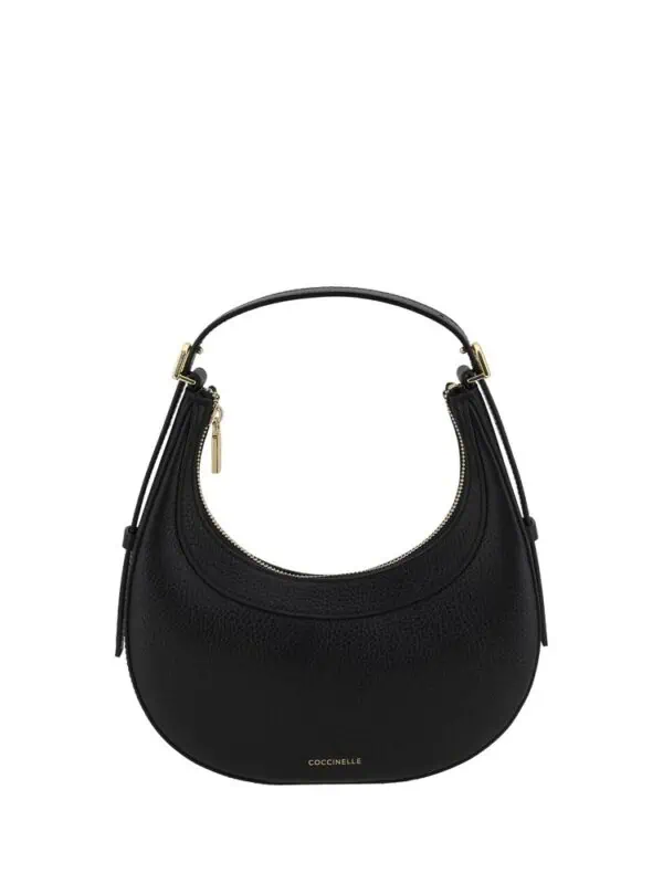 Elegant black leather Coccinelle handbag with gold hardware, rounded shape, and adjustable strap for a luxurious and versatile accessory.