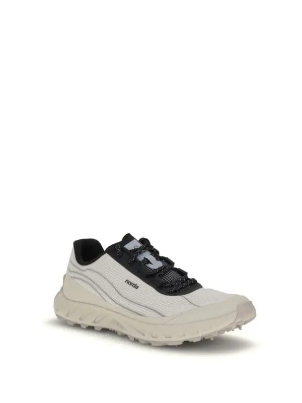 Nordic outdoor running shoe in white and black with cushioned sole for trail walking and hiking.