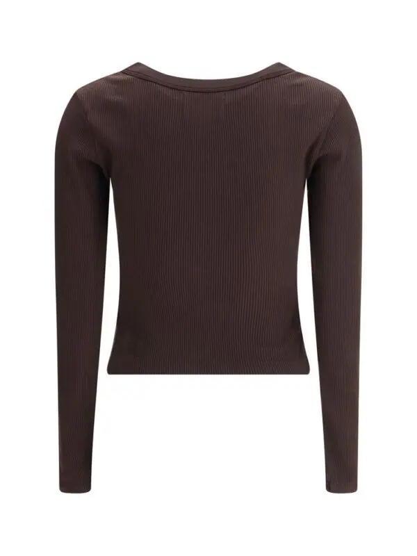 Soft brown ribbed long sleeve sweater, stylish and comfortable women's knitwear for casual or office wear. Perfect for layering in colder months.
