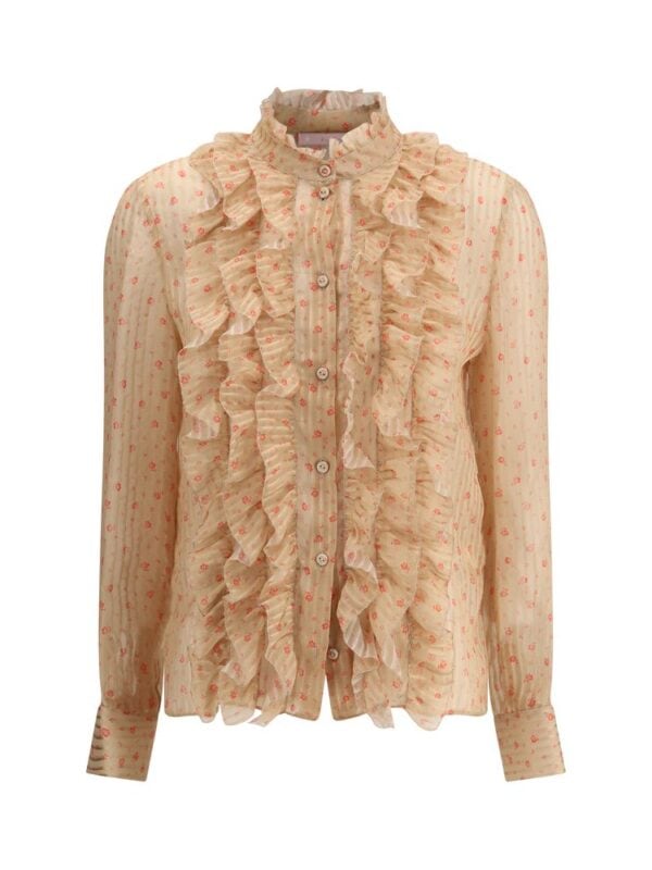 Silk chiffon blouse with ruffle details, floral print, and button-front closure by Lux Brands. Elegant and feminine fashion piece.