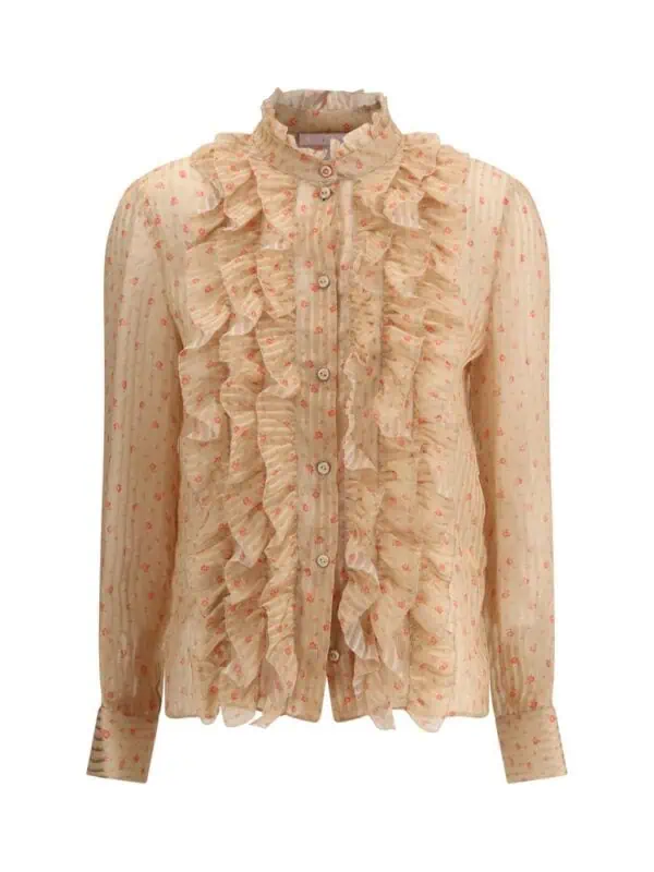 Silk chiffon blouse with ruffle details, floral print, and button-front closure by Lux Brands. Elegant and feminine fashion piece.