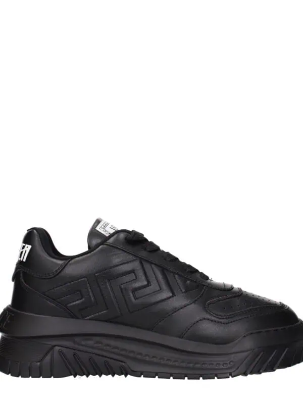 Black luxury designer sneakers with bold geometric patterns and chunky soles, perfect for high-end streetwear fashion. Stylish, durable, and comfortable for everyday wear.