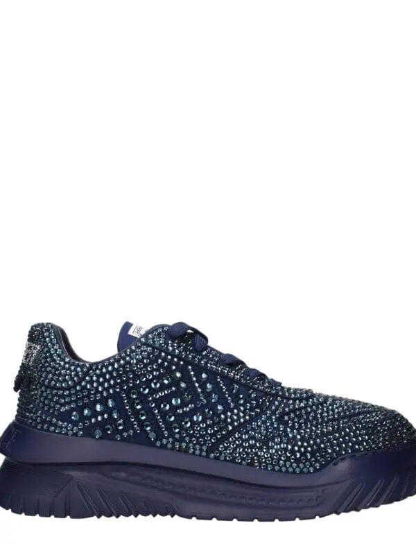Luxury navy blue sneaker adorned with sparkling rhinestones and stylish design for a high-end fashion statement.