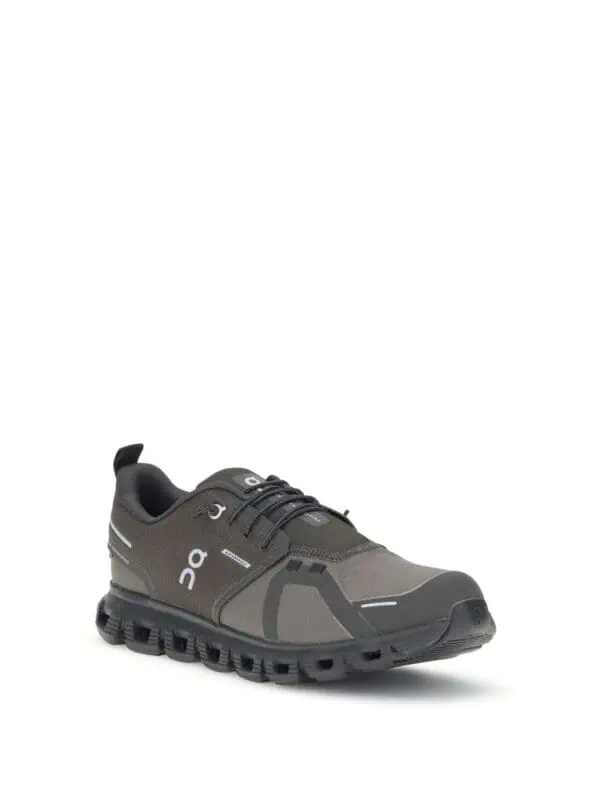 Athletic black and gray running shoe with cushioned sole and breathable upper, perfect for sports and casual wear from Lux Brands.