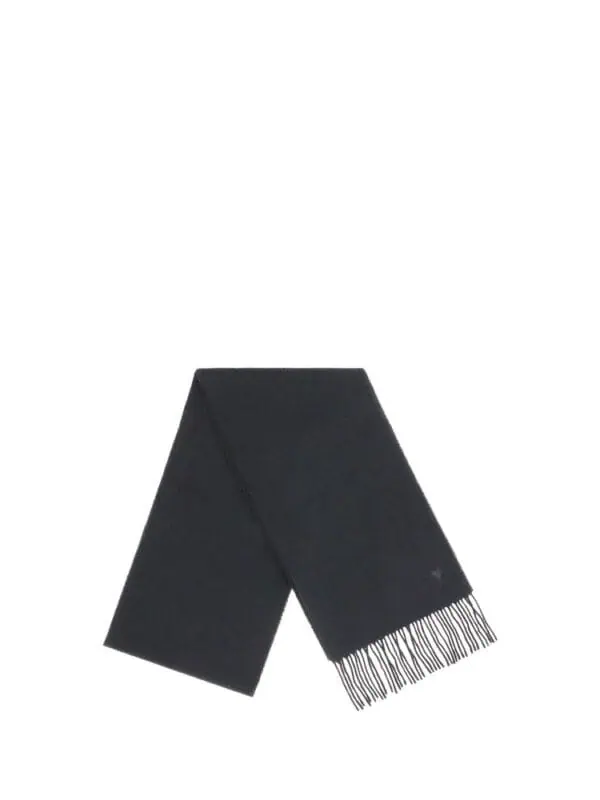 Soft black cashmere scarf with fringed edges, luxurious and warm for winter wear. Perfect accessory for elegant outfits and cold weather. Made from high-quality materials for comfort and style.