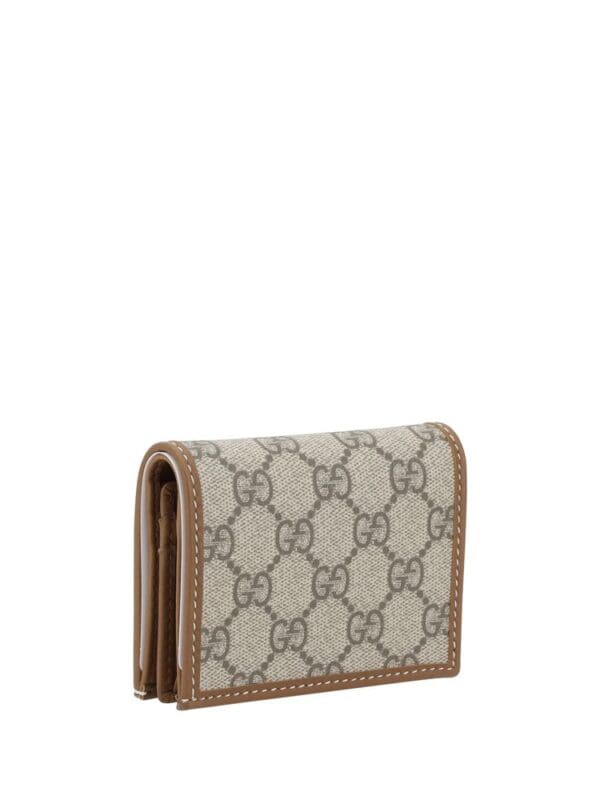 Gucci Monogram Canvas Leather Trim Bifold Wallet with Brown Interior - Luxury Designer Wallets for Women and Men.