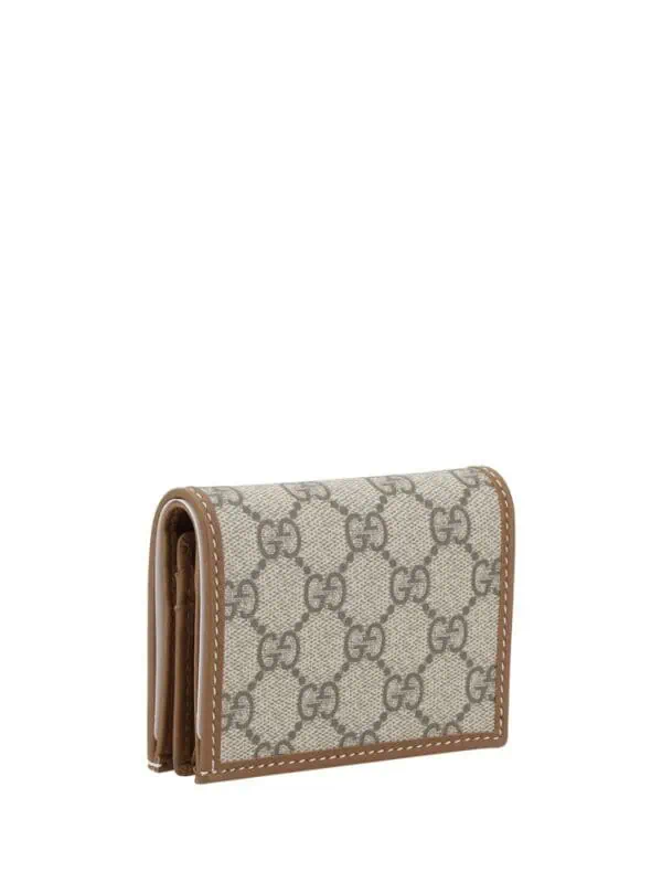 Gucci Monogram Canvas Leather Trim Bifold Wallet with Brown Interior - Luxury Designer Wallets for Women and Men.