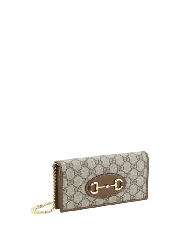Gucci GG Supreme brown silk wallet with gold hardware and chain strap, luxury designer accessory for women.