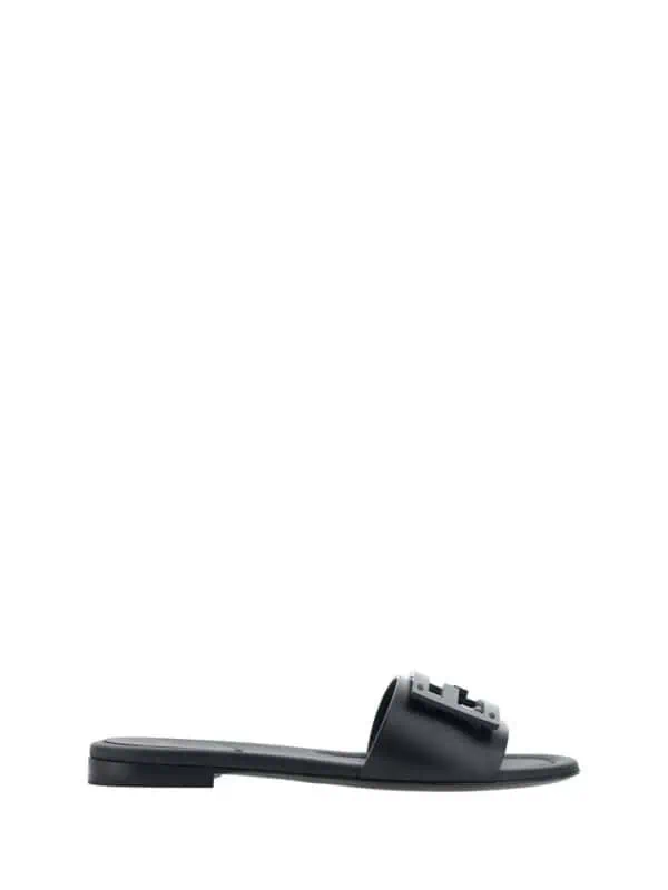 Lux Brands stylish black slide sandal with statement logo strap, perfect for casual and chic summer looks. Comfortable slip-on design offers easy, everyday wear for women who love luxury fashion.