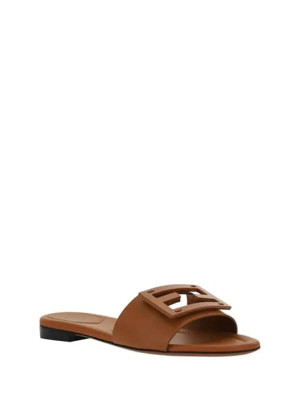 Slide sandals with large decorative buckle in tan leather luxury women's footwear from Lux Brands.